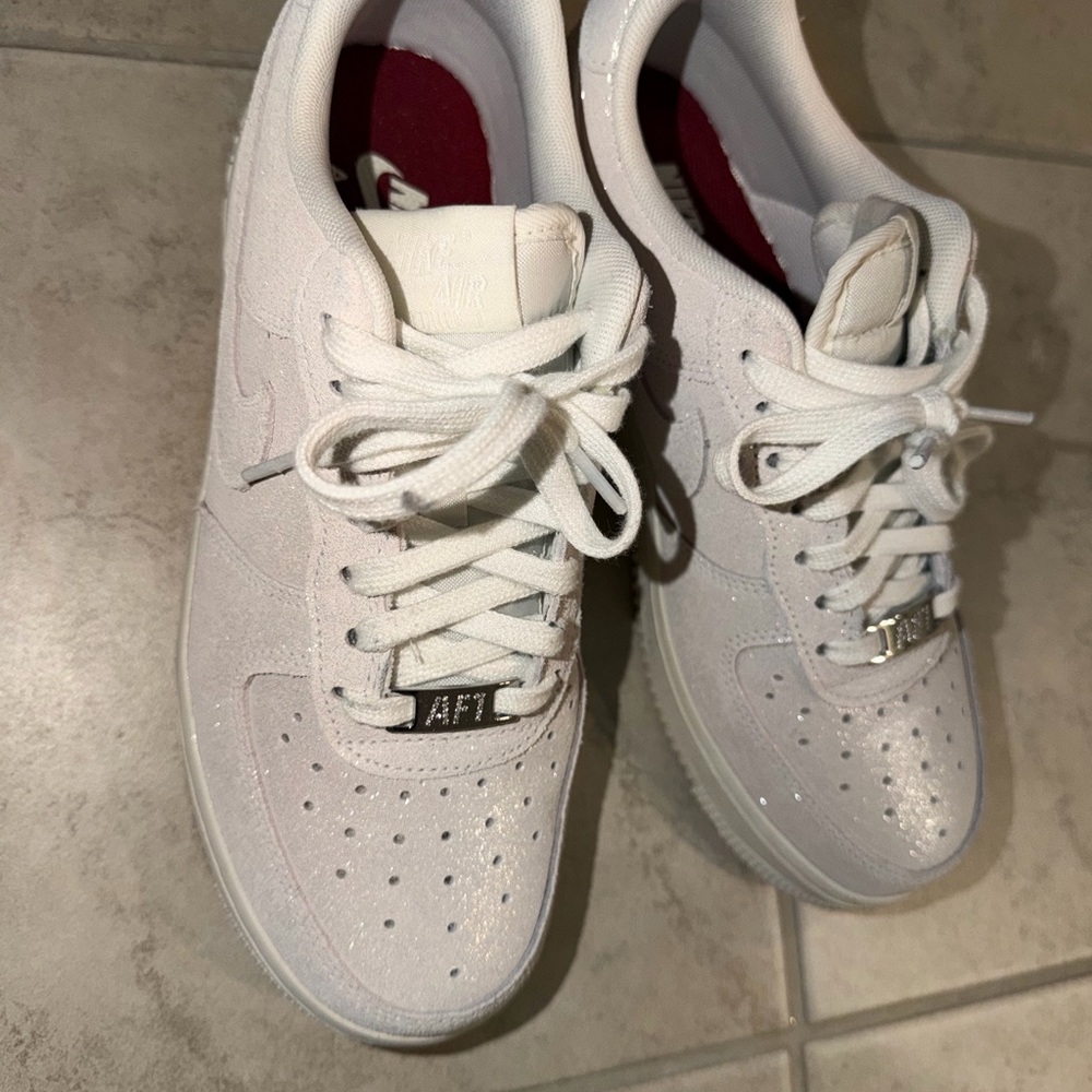Nike Air Force 1 White Sneakers with Silver Accents